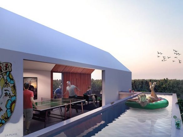 Rooftop pool and people playing ping pong at Eskina Playa del Carmen