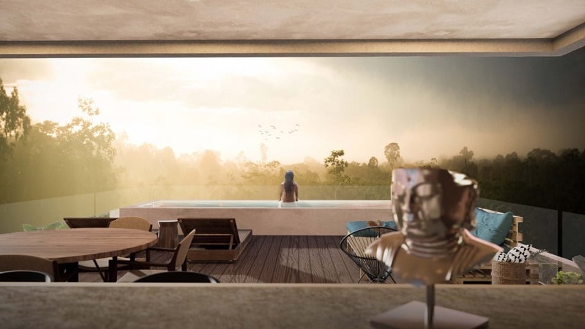 Pool terrace and woman inside surrounded by fog, small buddha sculpture at Kaoba Tulum
