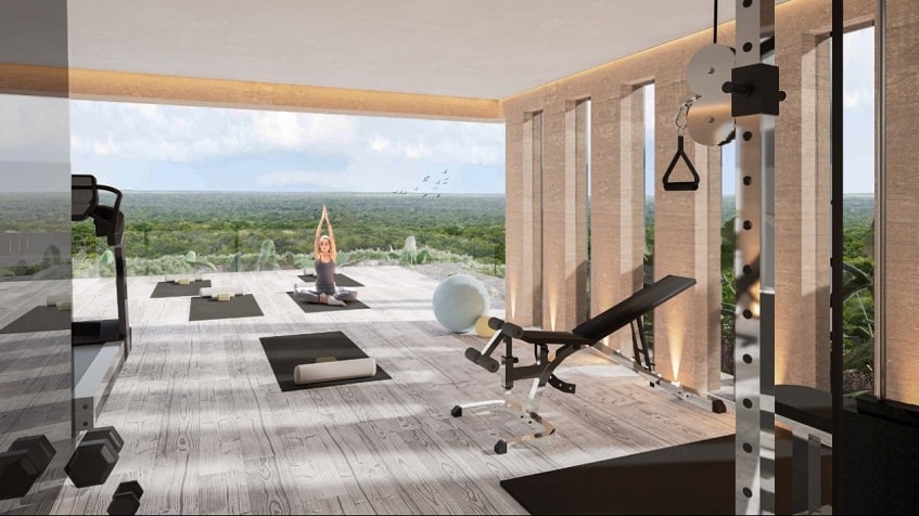 Yoga and gym open roof deck, woman meditating at Kaoba Tulum