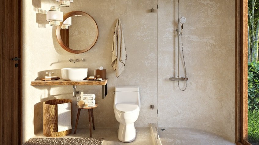 Bathroom with a shower and toilet at Muki Tulum