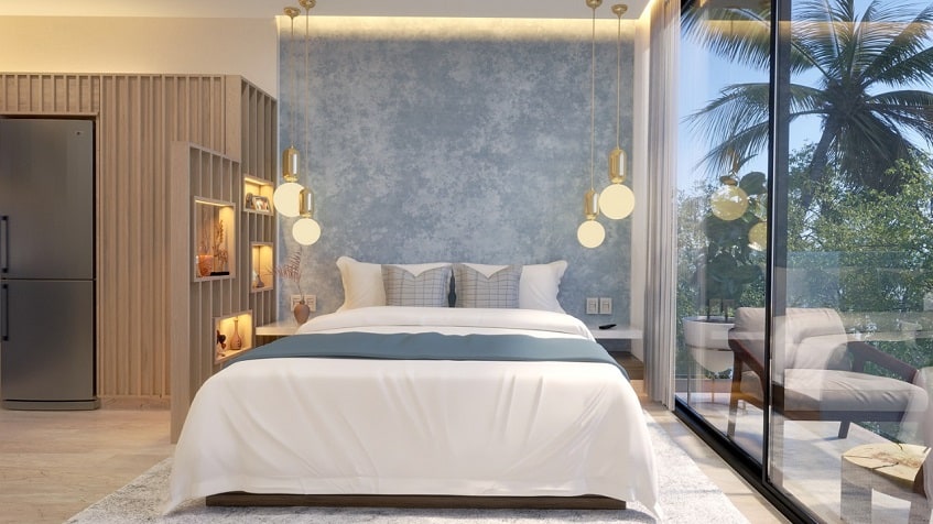 Bedroom with a bed next to window terrace at Blu 38 Playa del Carmen
