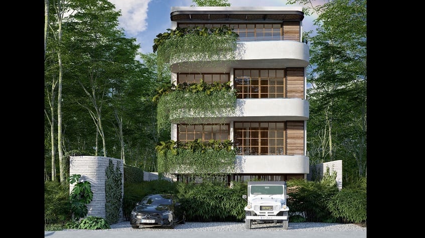 Three level residential building with three balconies and parking lot at Muki Tulum