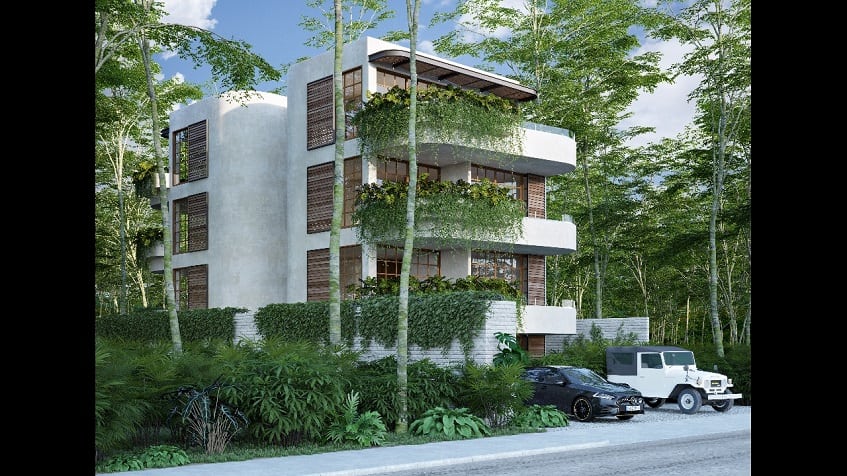 Three level residential building with three balconies and parking lot at Muki Tulum