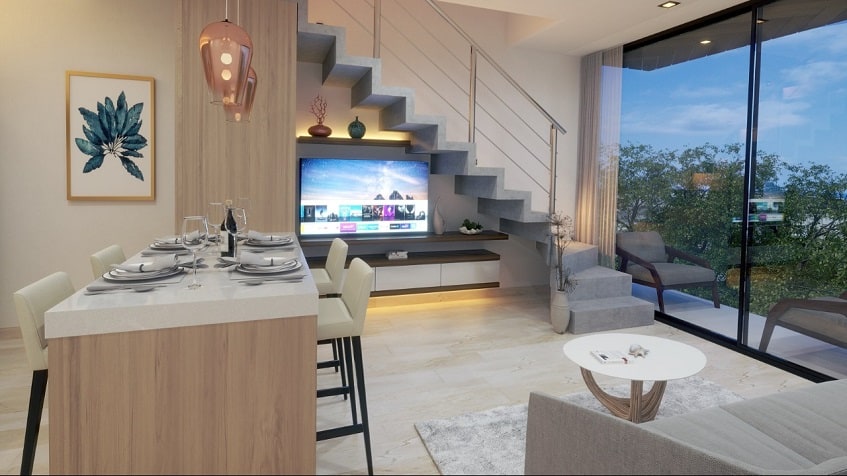 Living room with a TV under the stairs at Blu 38 Playa del Carmen