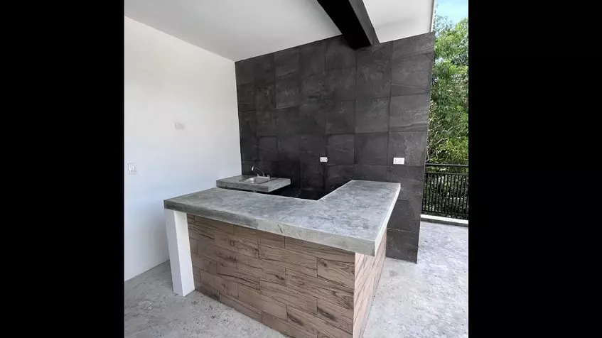 Kitchen bar and a sink on the rooftop at Mayakoba House