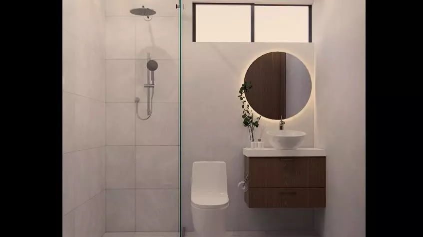 White bathroom with a shower cabin at Sur 307 Condominios