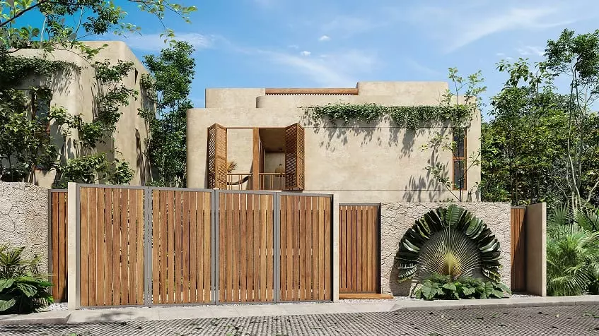 Residential building facade with wooden fence at Retiro Tulum Artisan Homes