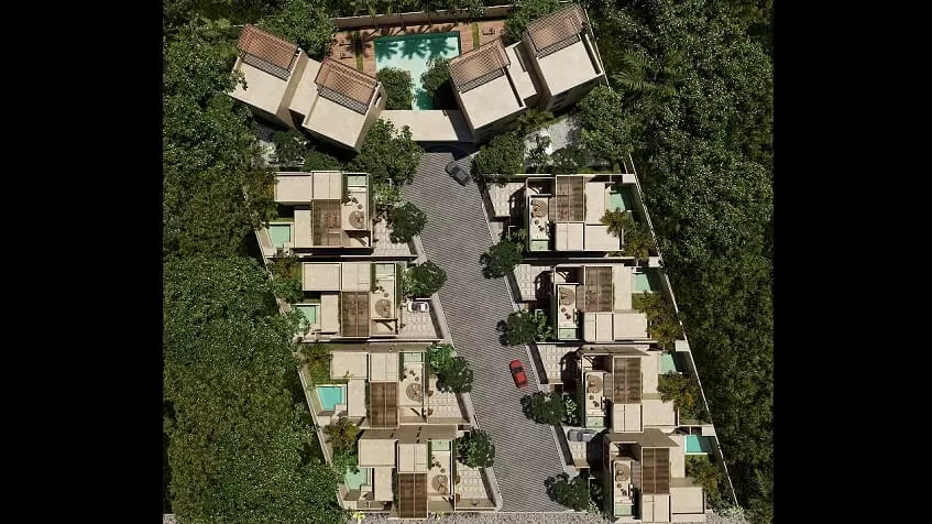 Aerial view of a residential area with small pools by each house at Retiro Tulum Artisan Homes