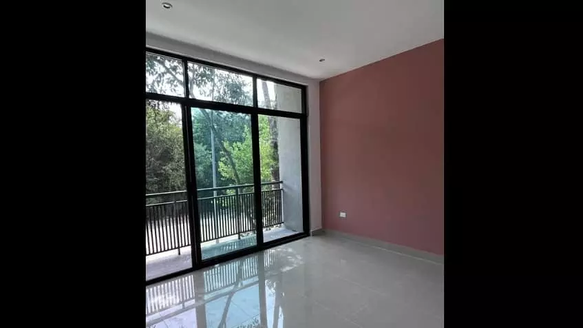 Unfurnished room with terrace and view of park at Mayakoba House