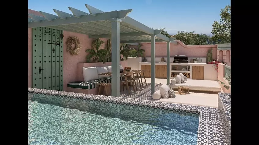 Rooftop pool, table and chairs under a pergola, a grill with some cooking accessories and a sink at Pink Riad Tulum