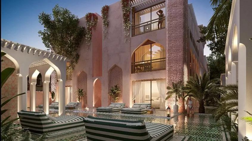 Residential Building, arabic style facade, pool and sunbeds at Pink Riad Tulum