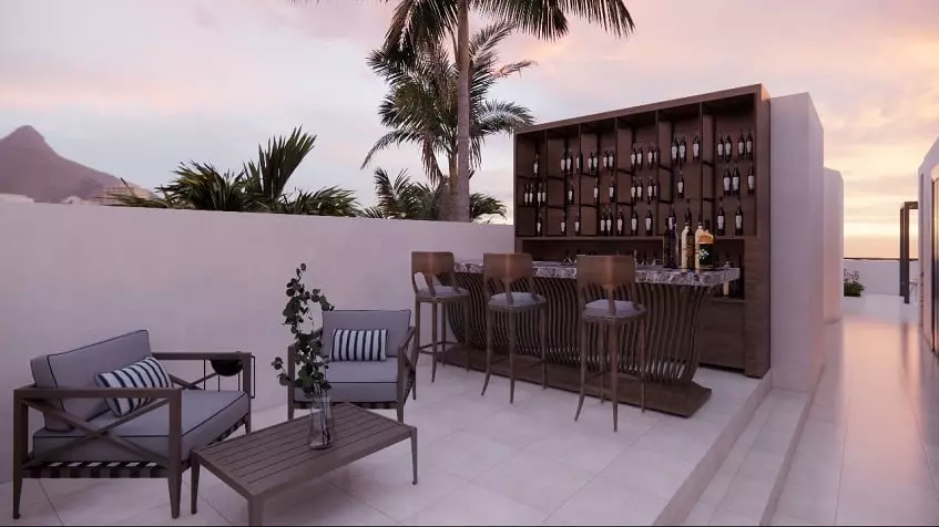 Rooftop bar and sitting area at Sur 307 Condominios