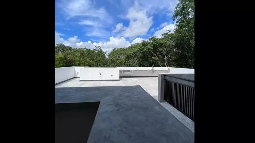 Unfurnished rooftop, top of the trees behind the edge at Mayakoba House