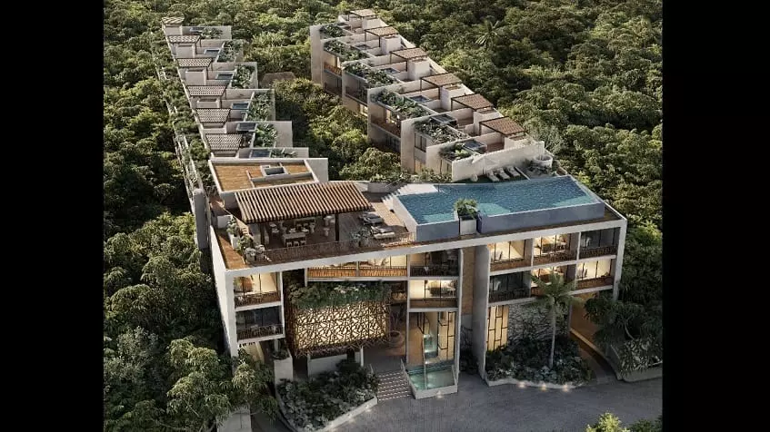 Aerial view of a residential area surrounded by jungle, pool on the roof of Waye Condos