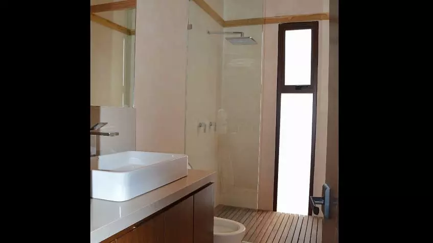 Bathroom with a shower cabin, toilet at Kiino Cozumel