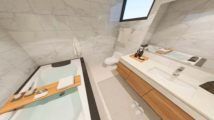 Bathroom with a bathtub,a toilet and a sink at Origin by Wolf Cancun