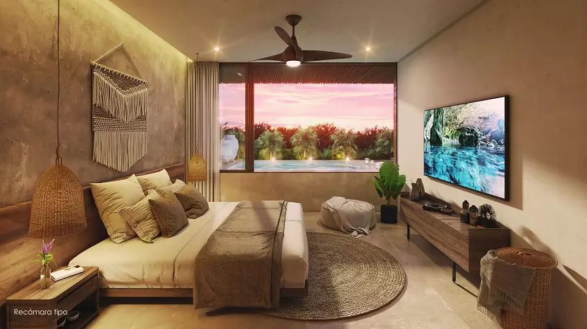 Bedroom with a bed in front of TV screen, mirror, pool terrace at Nequen Kukulkan Tulum