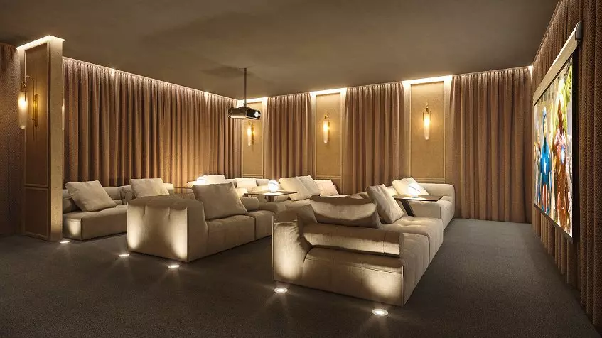 Cinema audience with comfortable sofas and large screen at Origin by Wolf Cancun