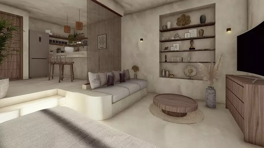 Build in sofa in front of TV screen, kitchen at Cocay Lofts Tulum