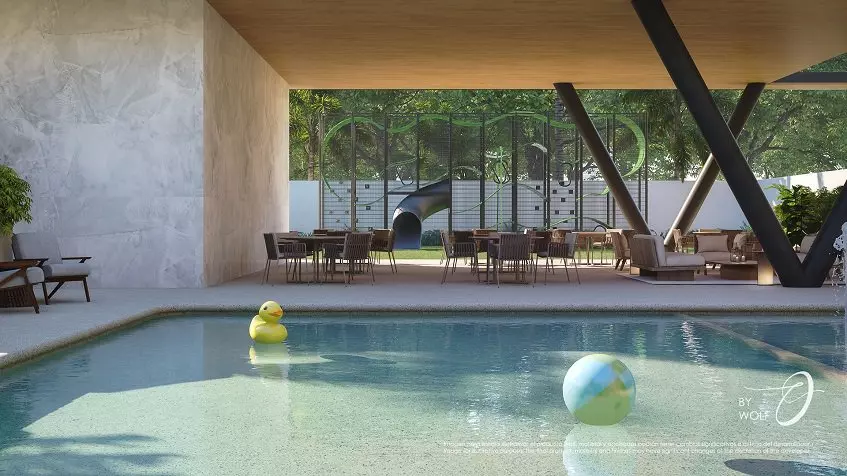 Pool and a yellow duck, a ball, dining area and kids playground in the background at Origin by Wolf Cancun