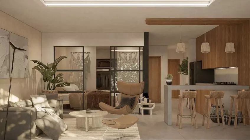 Living room with a kitchen, bedroom behind a transparent sliding door at Isabella Condos