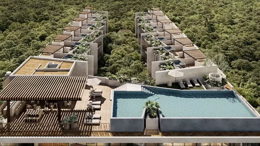Aerial view of a residential area surrounded by jungle, pool on the rooftop at Waye Condos