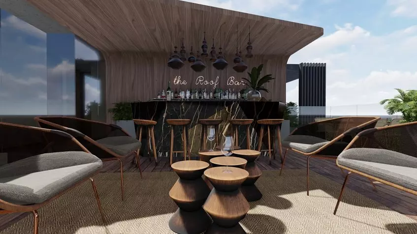 Rooftop bar with small tables at Alizee Tower Playa del Carmen