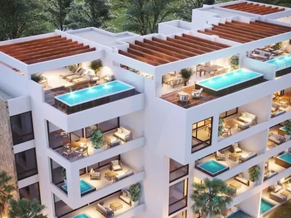 Residential building with pool terraces on each level at The Peninsula Tulum