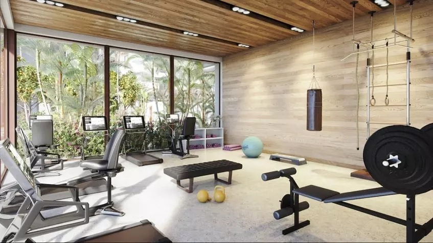 Gym room with treadmills and other tools at The Peninsula Tulum