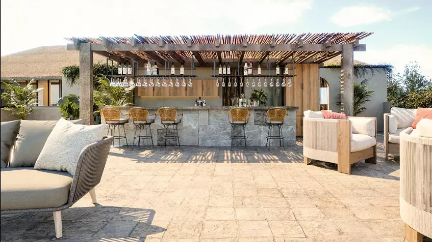 Rooftop bar under a pergola, lounges at Xiib Kaab Tulum