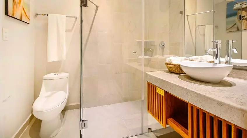 Bathroom with a sink and shower at Selvanova Playa del Carmen