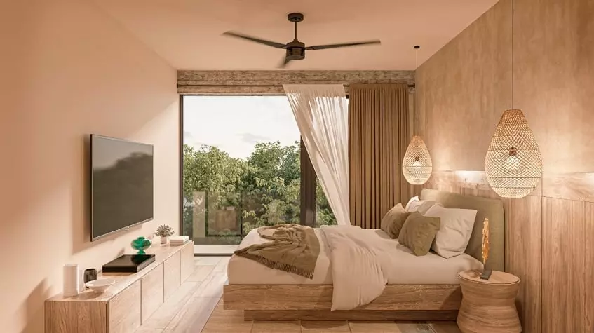 Bedroom with a bed in front of TV screen, jungle view at Nuup Tulum Region 8