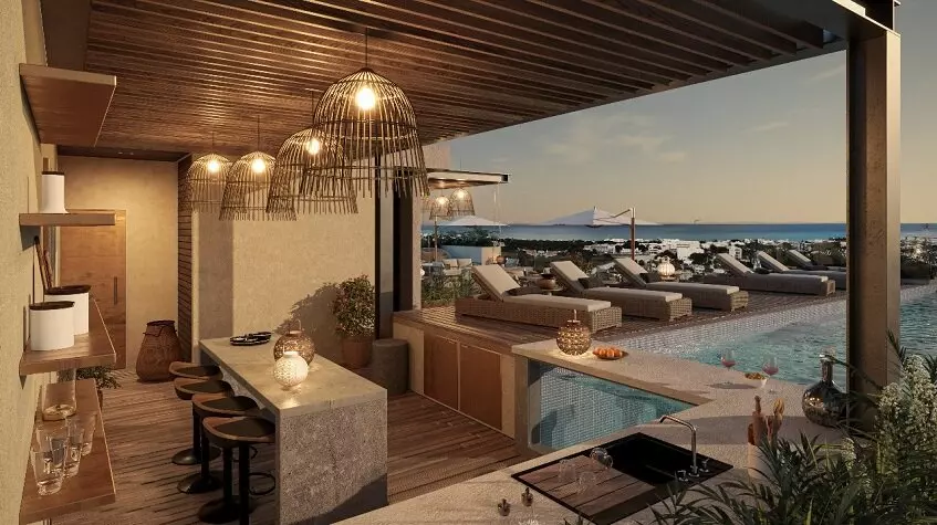 Rooftop pool bar and solarium with ocean view at Ocean Life Playa del Carmen