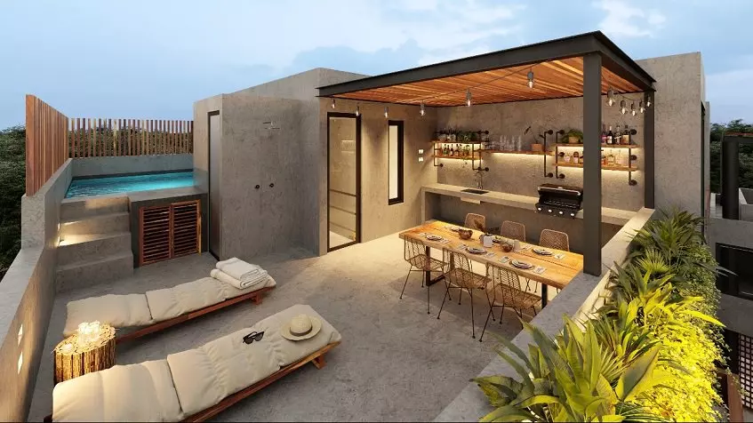 Rooftop area with a grill under pergola and swimming pool at Kateen Tulum