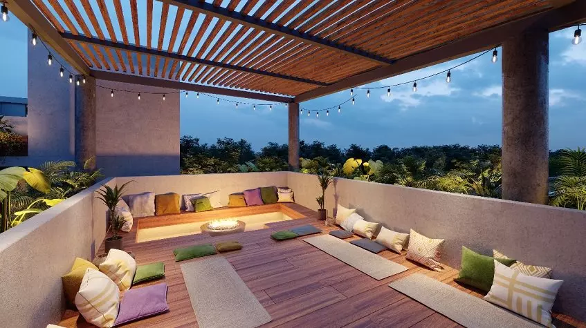 Rooftop area with cushions and sitting nest, jungle view at Kateen Tulum