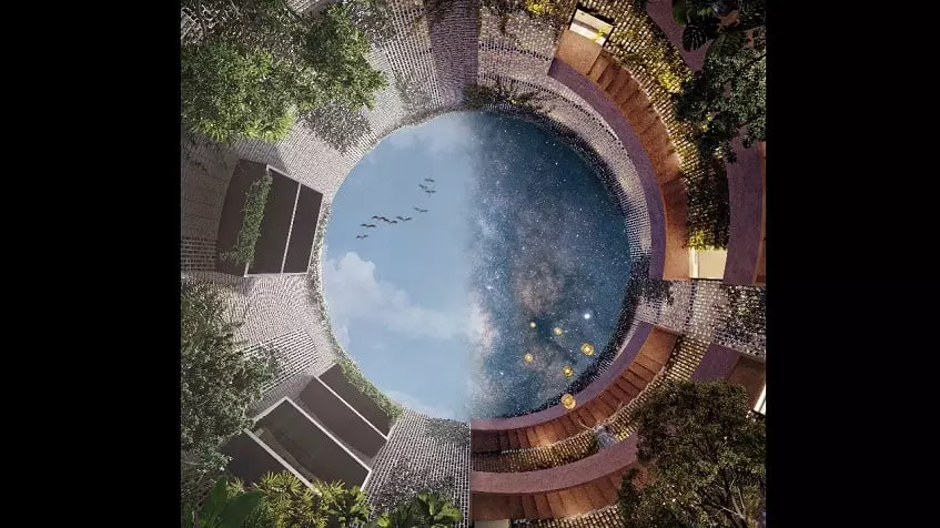 Residential building forming circle and sky-eye view from the bottom to the top a at Oniric Tulum