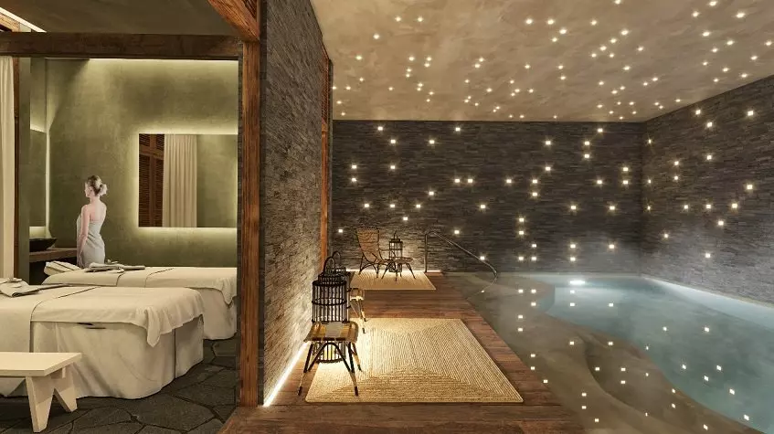 Two massage beds and pool with star lights at Acalai Beach Tulum
