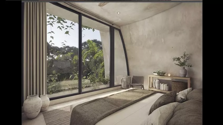 Bedroom with a garden terrace view at Duna Tulum