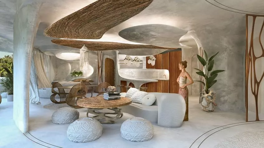 Modern living area and kitchen, woman standing in the middle at Azulik Residences Tulum