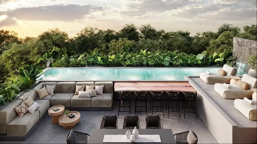 Rooftop pool and lounge area, jungle view at Brahma Tulum