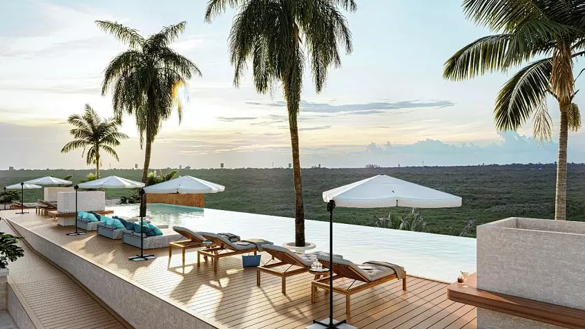 Rooftop pool, solarium and view of the jungle at Tulum Bay Tankah