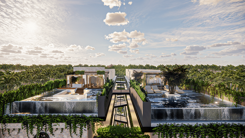 A terrace with 2 pools and views of the jungle at Hygge Tulum