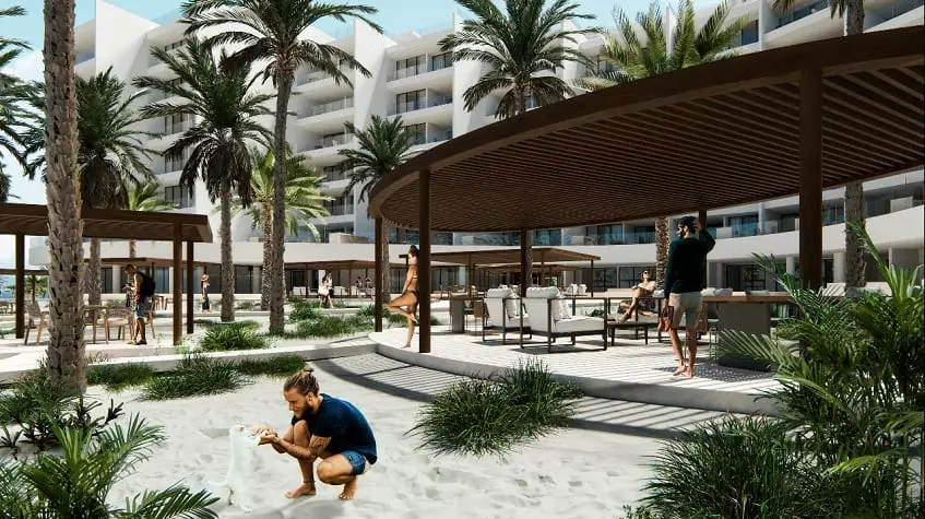 A common area on the beach with people around in Acanta Telchac Puerto