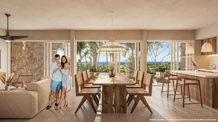 Large kitchen and dining room, a couple laughing, oceanview at Santamar Prime Akumal