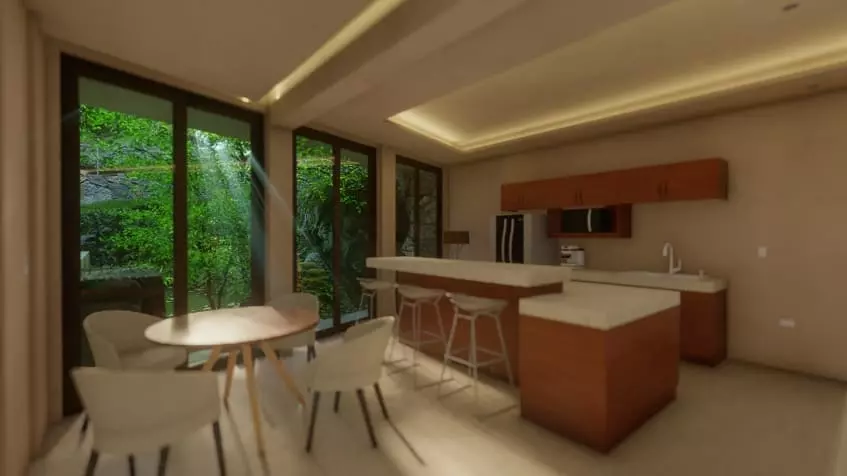 An open kitchen with a dining room and a garden in Laurel Cozumel
