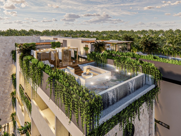 Aerial view of 2 terraces with Balinese beds at Hygge Tulum