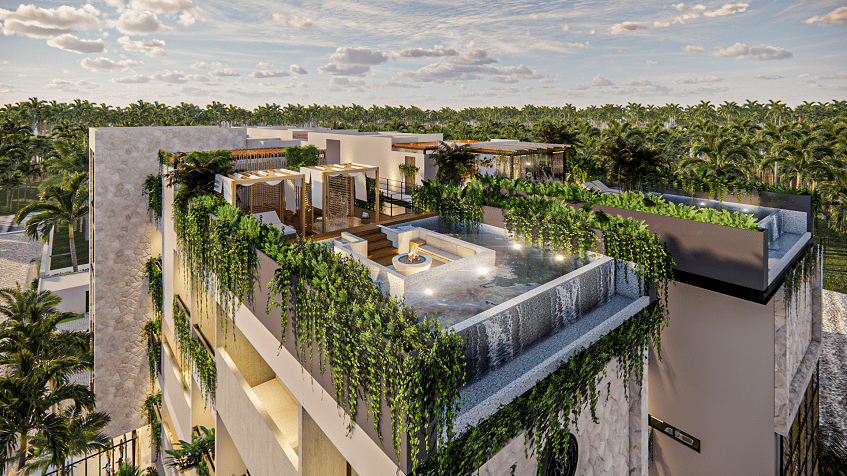 Aerial view of 2 terraces with Balinese beds at Hygge Tulum