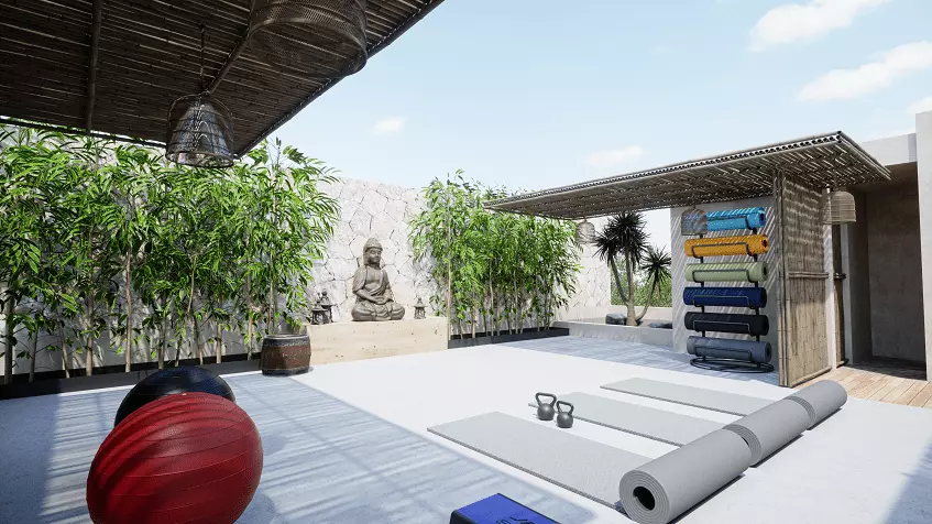 A yoga area with mats and a Buddha in Tson Tulum