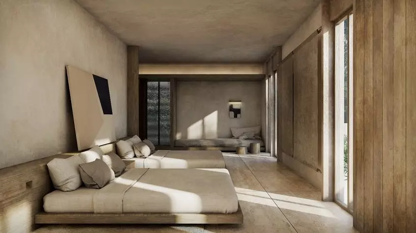 Master bedroom with 2 beds, pillows and a headboard in Candela Tulum