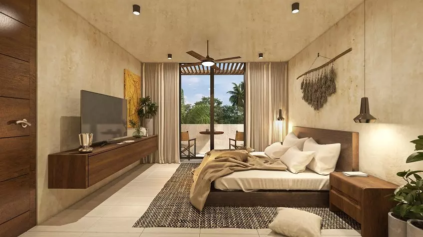 A bedroom with 1 bed and a terrace with 2 chairs in Selva Maya